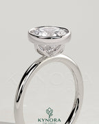 Kynora CJ 2ct round bezel solitaire engagement ring with petal gallery design in fine jewelry setting