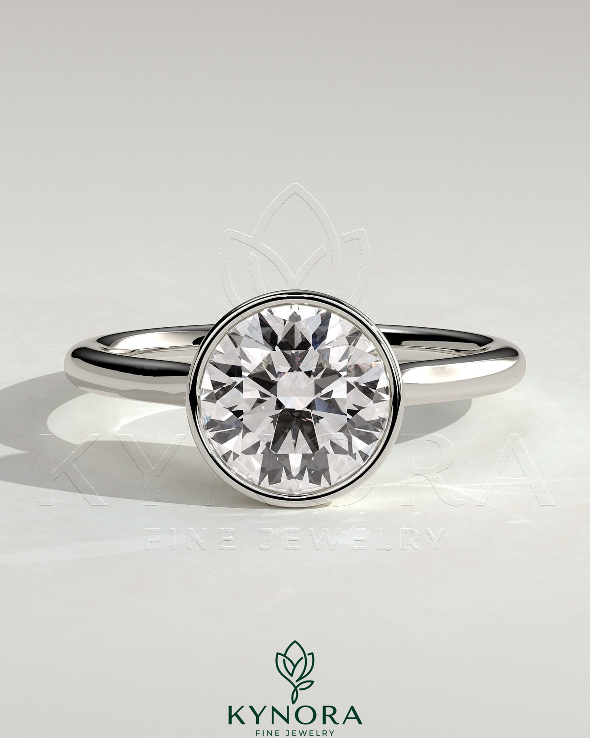 Kynora CJ 2ct round bezel solitaire engagement ring with twisted gallery design in sterling silver.