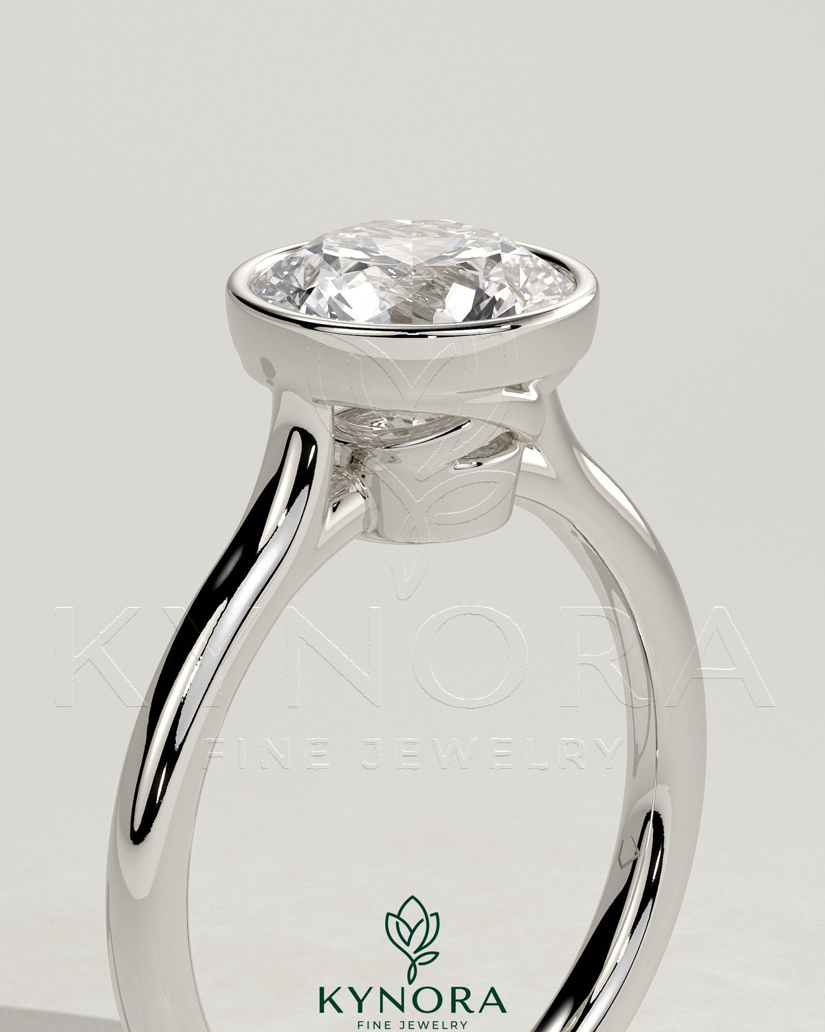 Kynora CJ 2ct round bezel solitaire engagement ring with twisted gallery setting, showcasing a sparkling central diamond and intricate band.