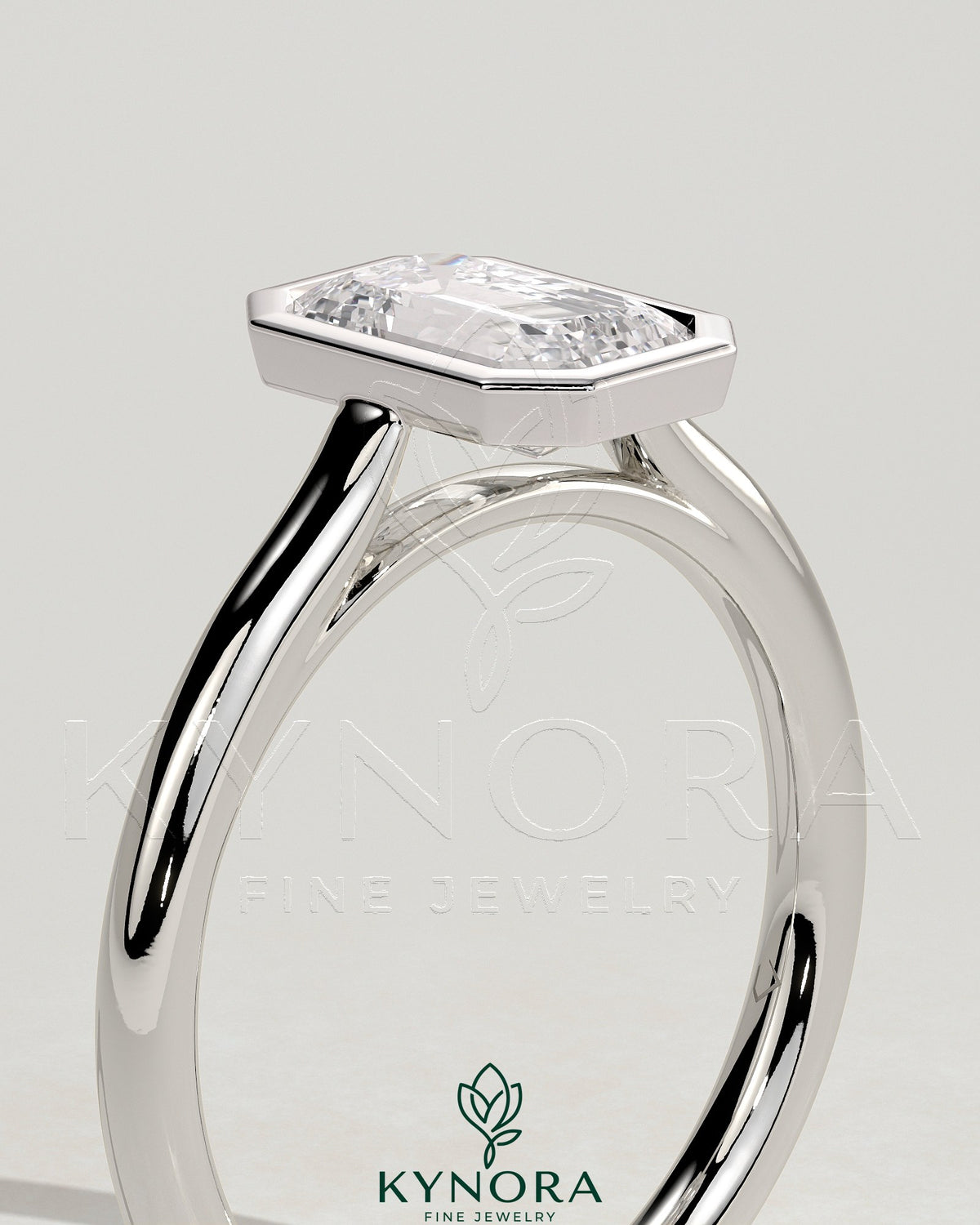 Kynora CJ statement 2ct emerald bezel solitaire engagement ring with open cathedral high setting, showcasing detailed craftsmanship.