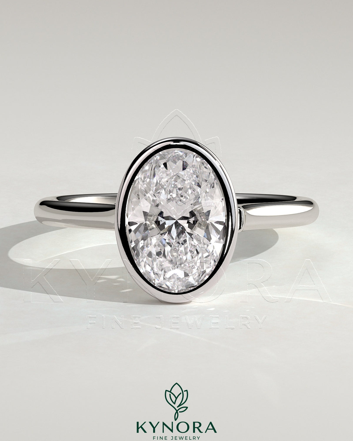 Kynora CJ statement 2-carat oval bezel solitaire engagement ring with open cathedral high setting, showcasing elegant jewelry design.