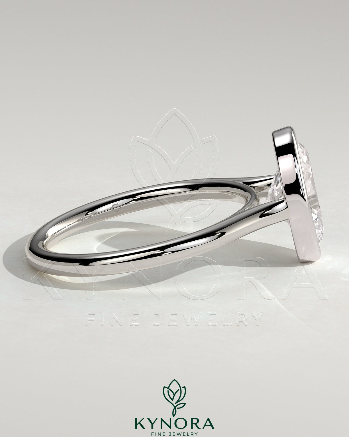Kynora CJ statement 2ct oval bezel solitaire engagement ring with open cathedral high setting and elegant design.