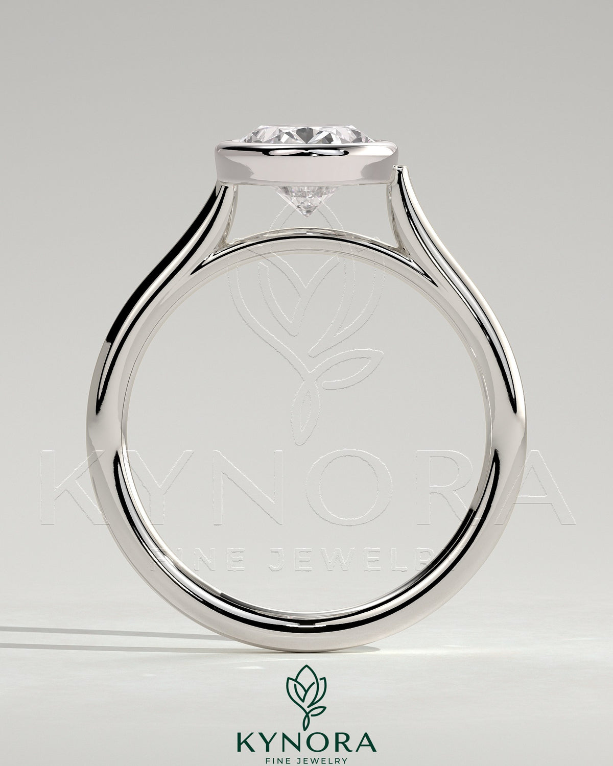 Kynora CJ statement 2ct oval bezel solitaire engagement ring with open cathedral high setting and elegant design.