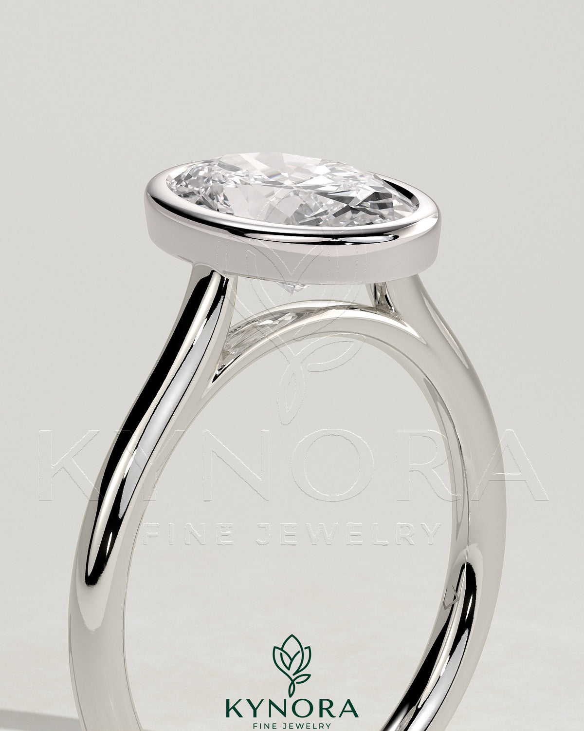 Kynora CJ Statement 2ct oval bezel solitaire engagement ring with open cathedral high setting and elegant design.