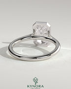 Kynora CJ statement 2ct radiant bezel solitaire engagement ring with open cathedral high setting, showcasing elegant diamond design.