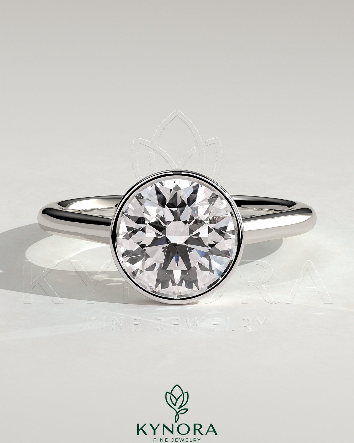 Kynora CJ statement 2ct round bezel solitaire engagement ring with open cathedral high setting, showcasing elegant jewelry design.