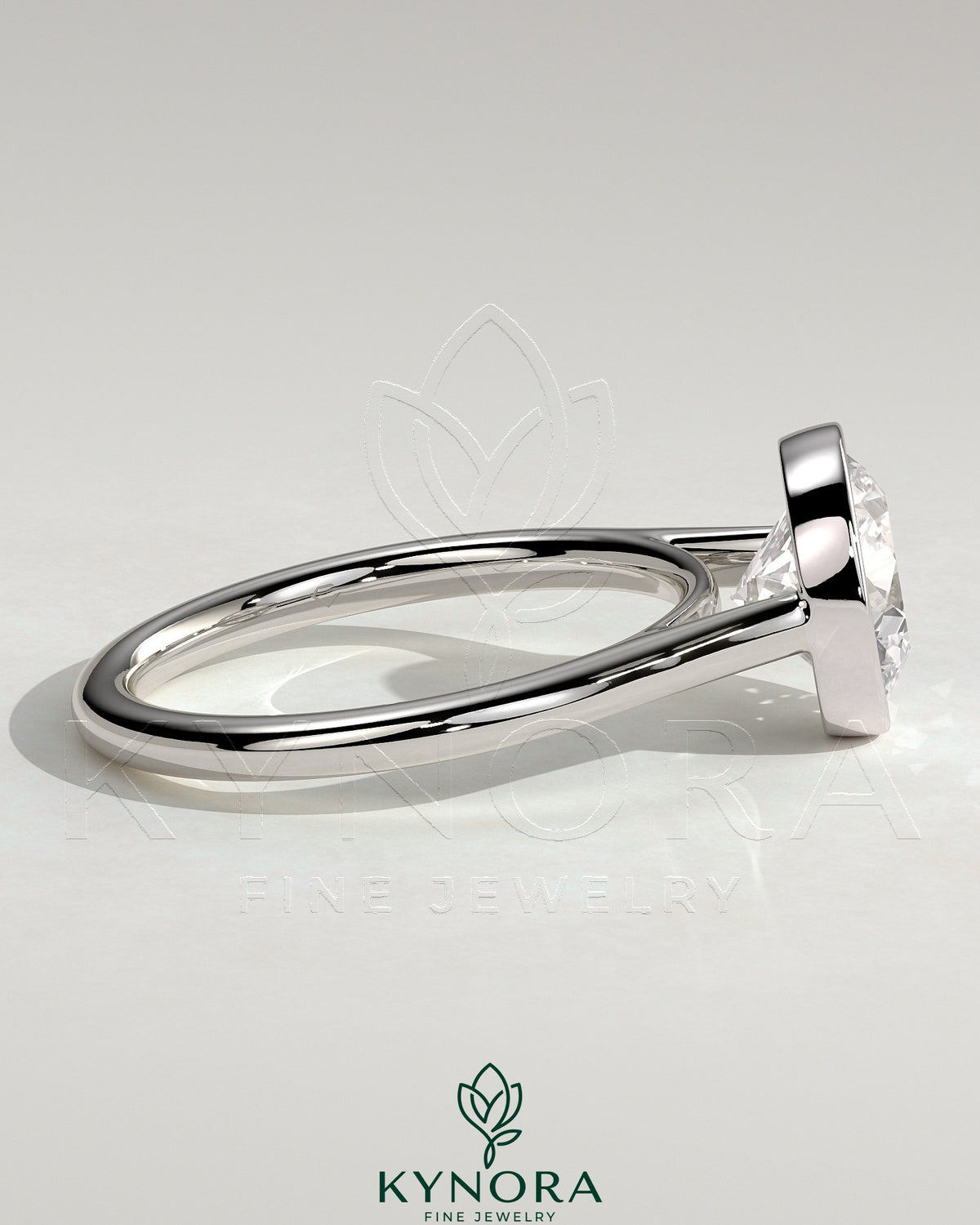 Kynora CJ statement 2ct round bezel solitaire engagement ring with open cathedral high setting, showcasing elegant jewelry design.