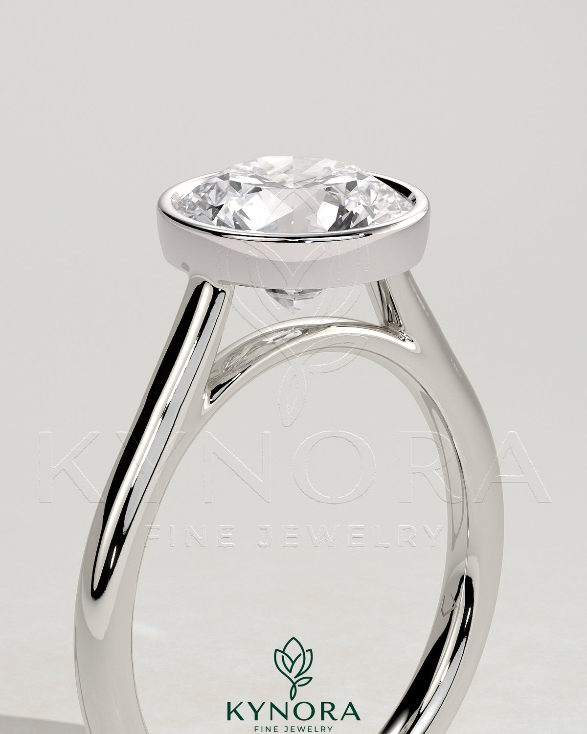 Kynora CJ statement 2ct round bezel solitaire engagement ring with open cathedral high setting, showcasing elegant jewelry design