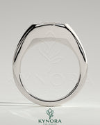 Kynora CJ 2ct elongated east-west bezel solitaire engagement ring with signet band showcasing a central diamond and sleek design.