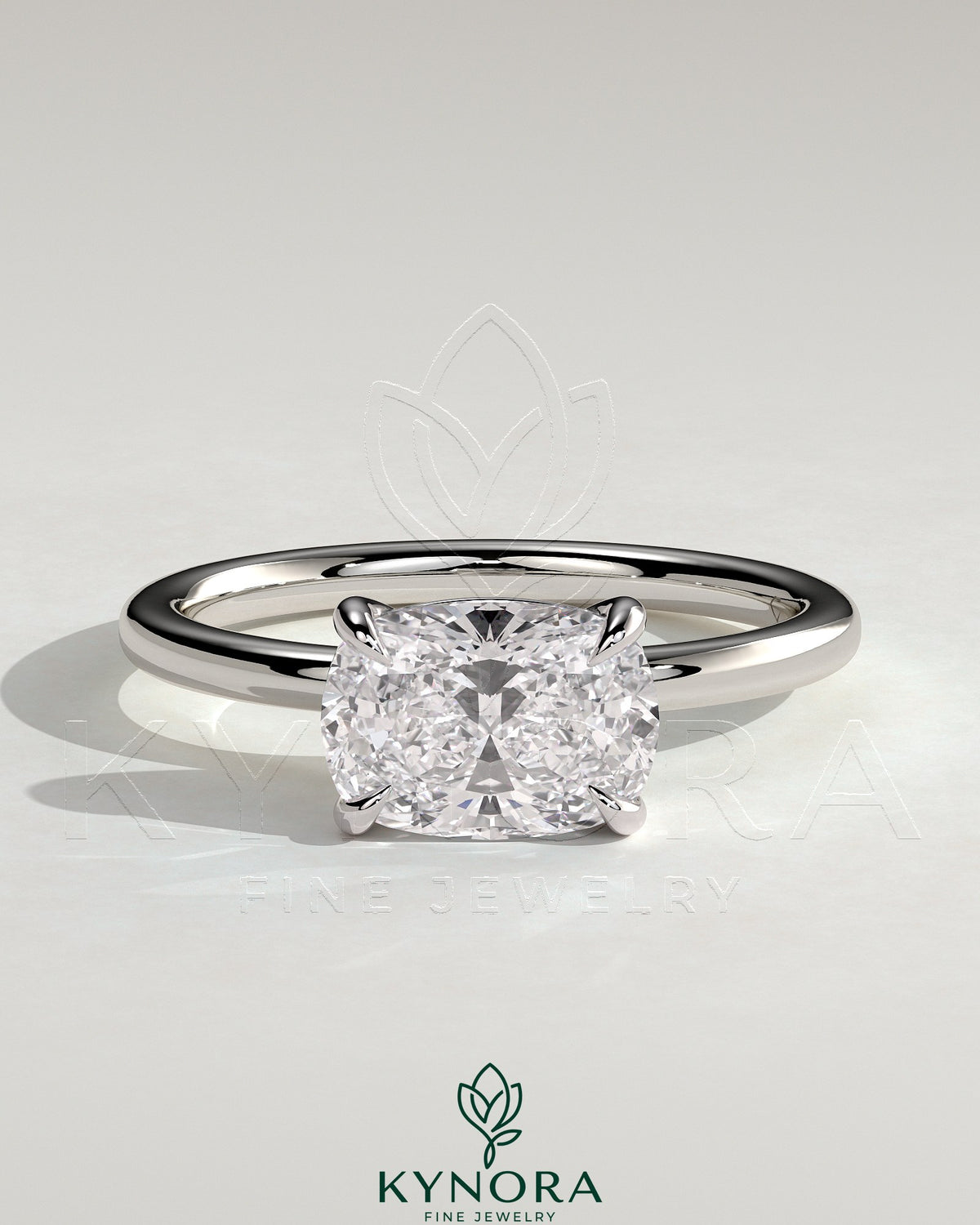 Kynora CJ 2-carat elongated cushion cut diamond engagement ring with east-west setting and claw prongs.