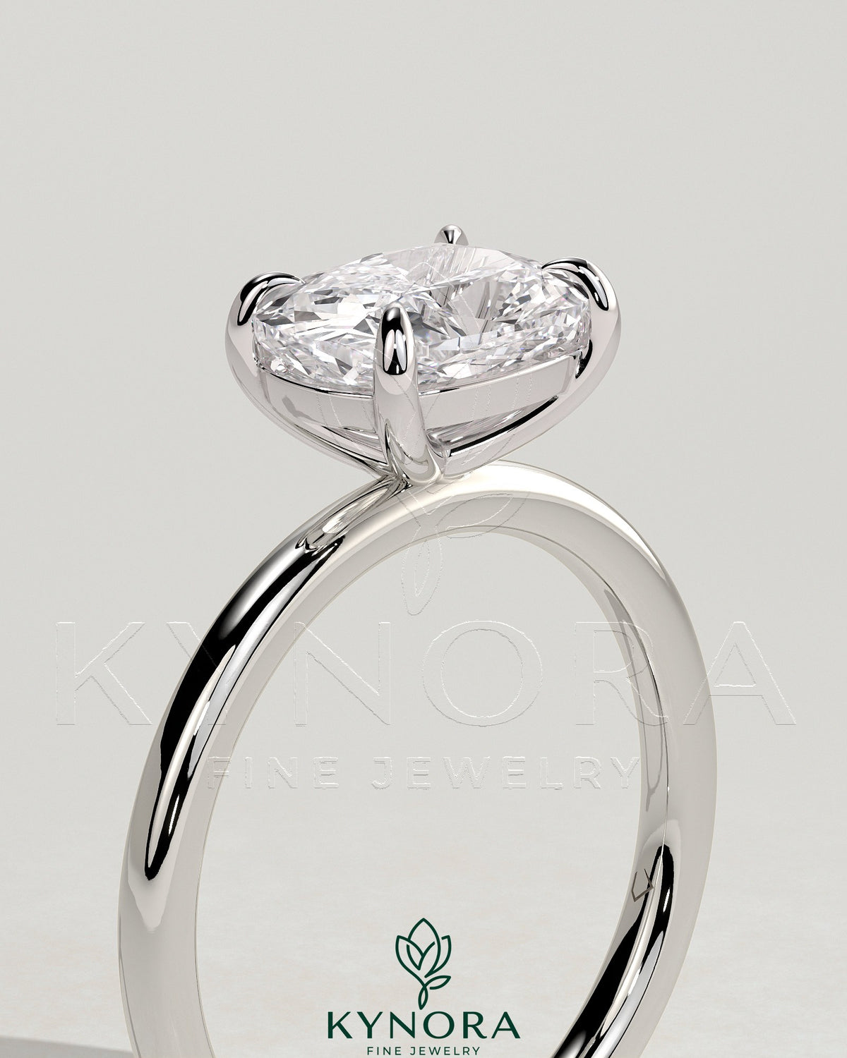 Elegant 2-carat elongated cushion cut east-west claw solitaire engagement ring by Kynora CJ, featuring a sparkling central diamond.
