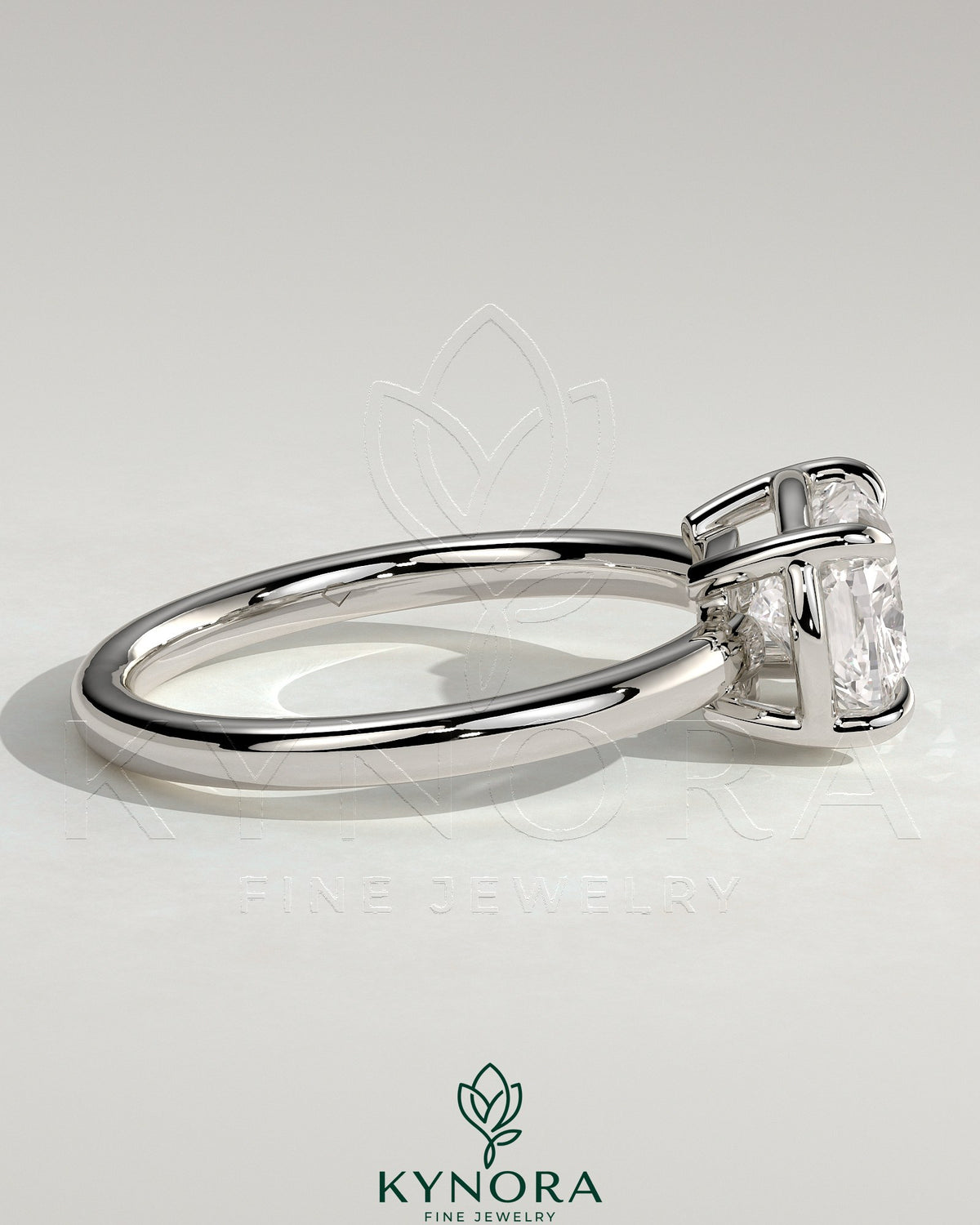 East-West 2ct cushion-shaped diamond solitaire engagement ring with bezel frame by Kynora CJ, featuring a sleek, elongated design.