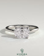 Kynora CJ 2ct elongated East-West cushion solitaire engagement ring with hidden halo and claw setting, showcasing elegant jewelry design.