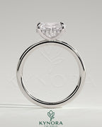 Elegant 2ct East-West cushion-shaped diamond engagement ring with hidden halo and claw setting by Kynora CJ.
