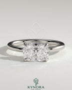 Kynora CJ 2ct elongated cushion East-West claw solitaire engagement ring with raised basket gallery, sparkling diamond setting.