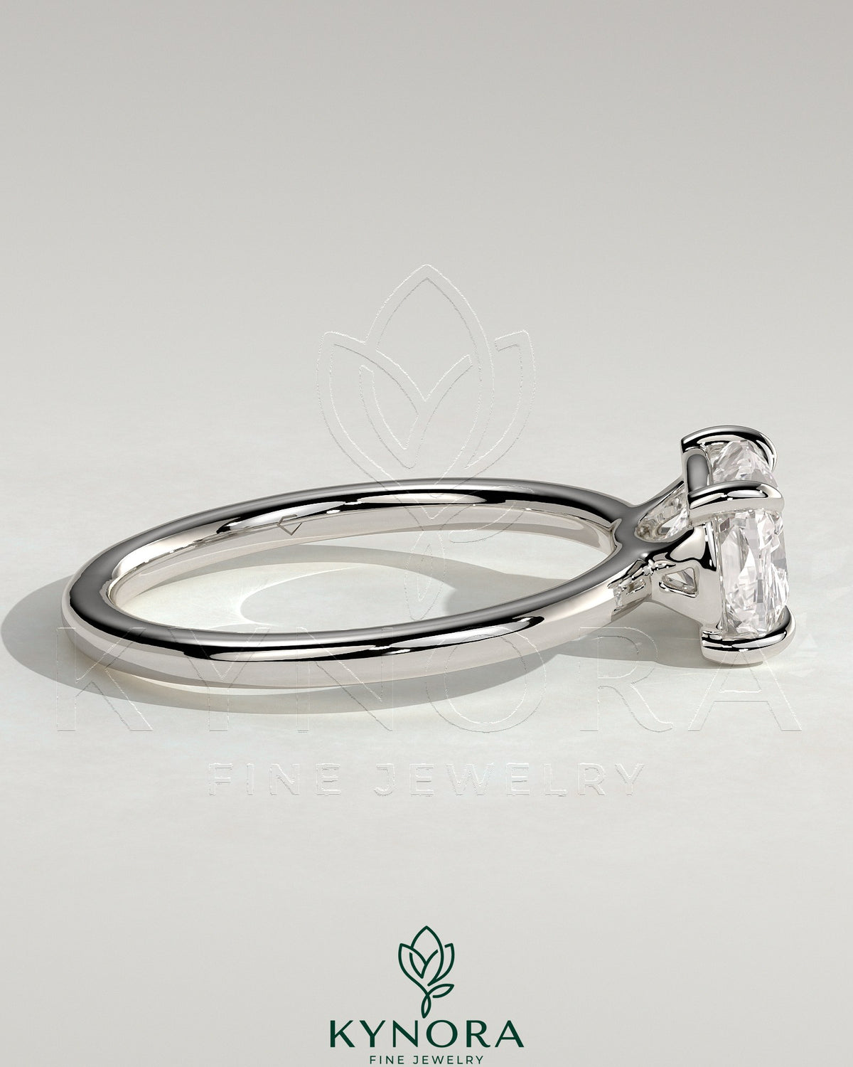 Kynora CJ 2ct elongated cushion cut diamond engagement ring with east-west setting and raised basket gallery design.