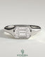 Kynora CJ 2ct emerald east-west bezel solitaire engagement ring with signet band showcasing a vibrant green emerald gemstone.