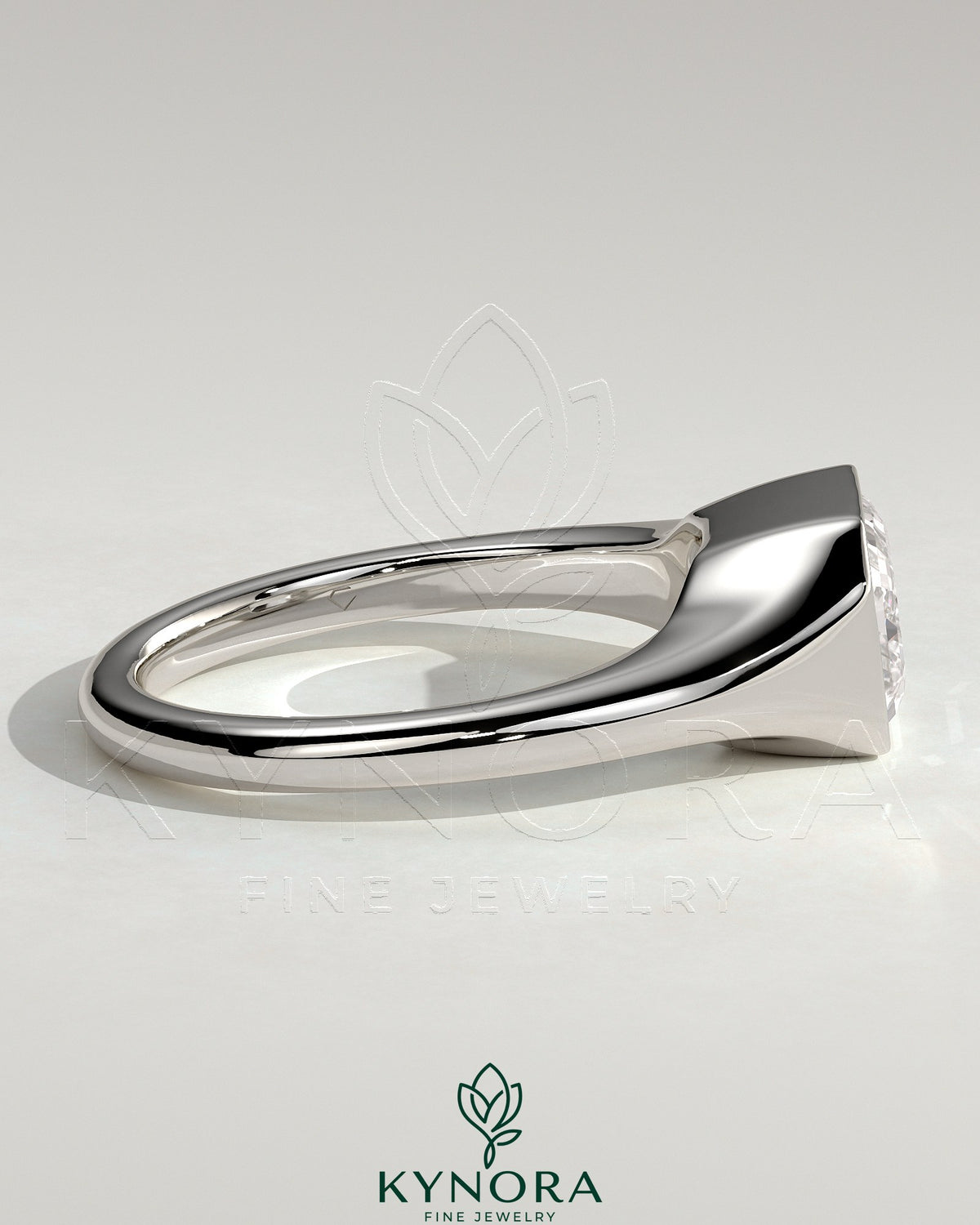 East-West 2ct emerald cut diamond solitaire engagement ring with bezel setting and signet band by Kynora CJ.