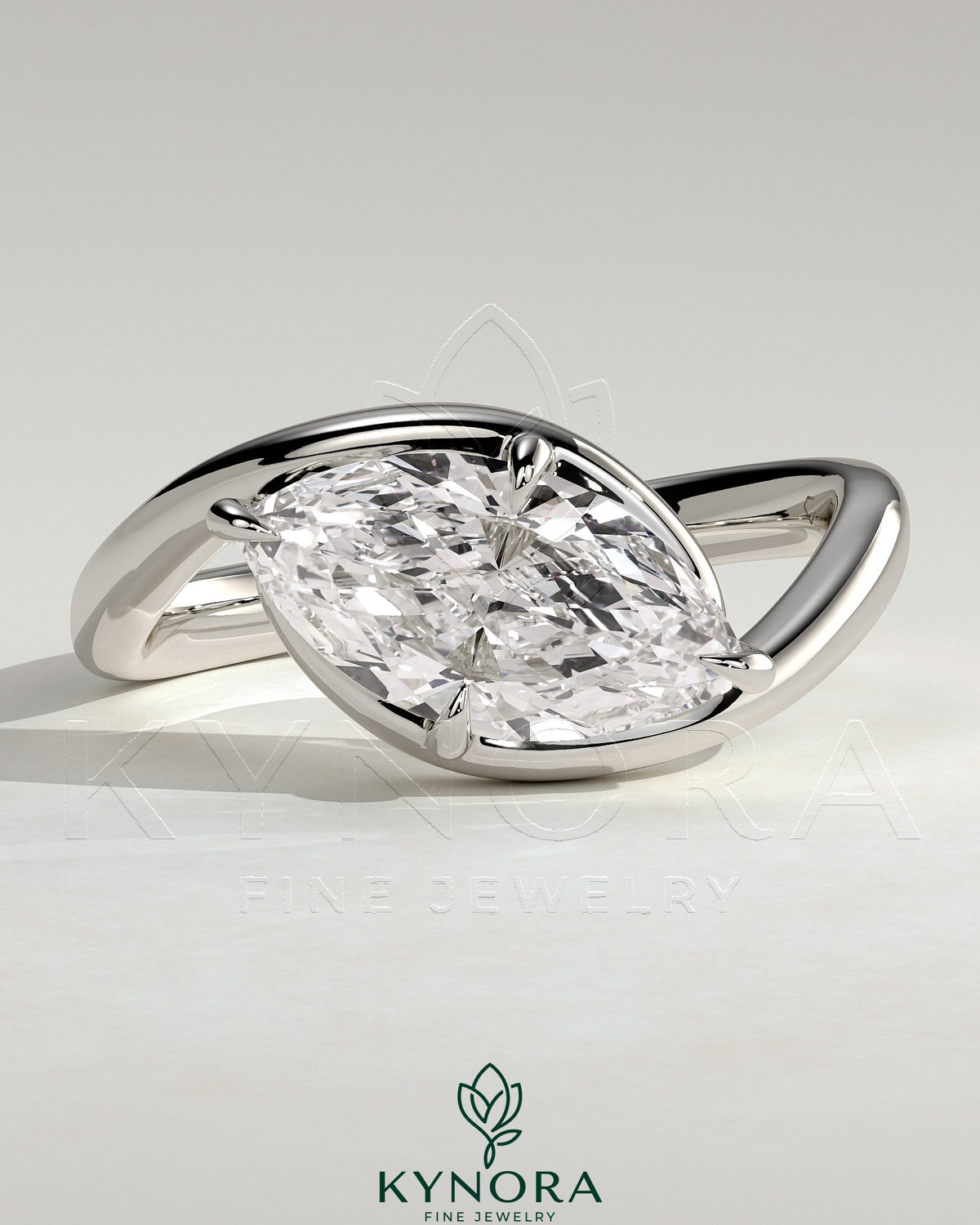 Kynora CJ 2ct marquise east-west claw solitaire engagement ring with bypass band, featuring a sparkling marquise-shaped diamond. Main image