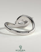 Kynora CJ 2ct marquise east-west claw solitaire engagement ring with bypass band, showcasing sparkling diamond and elegant design