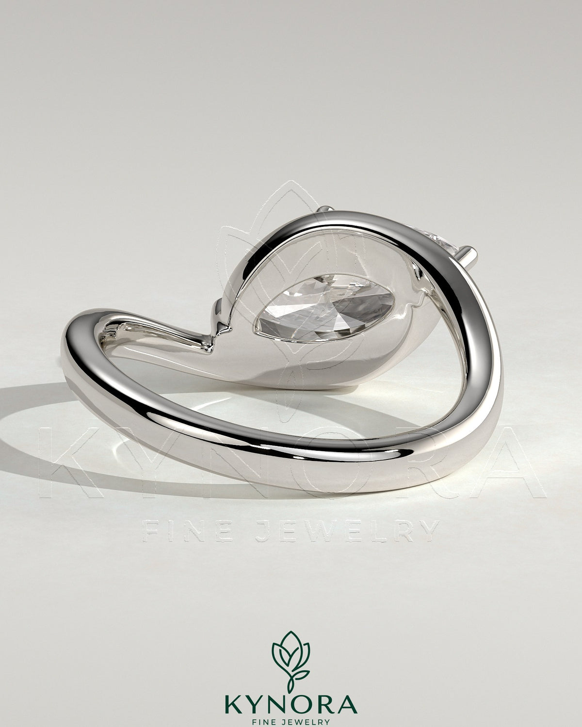Kynora CJ 2ct marquise east-west claw solitaire engagement ring with bypass band, showcasing sparkling diamond and elegant design
