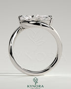 Kynora CJ 2ct marquise east-west claw solitaire engagement ring with bypass band, showcasing a sparkling marquise diamond.