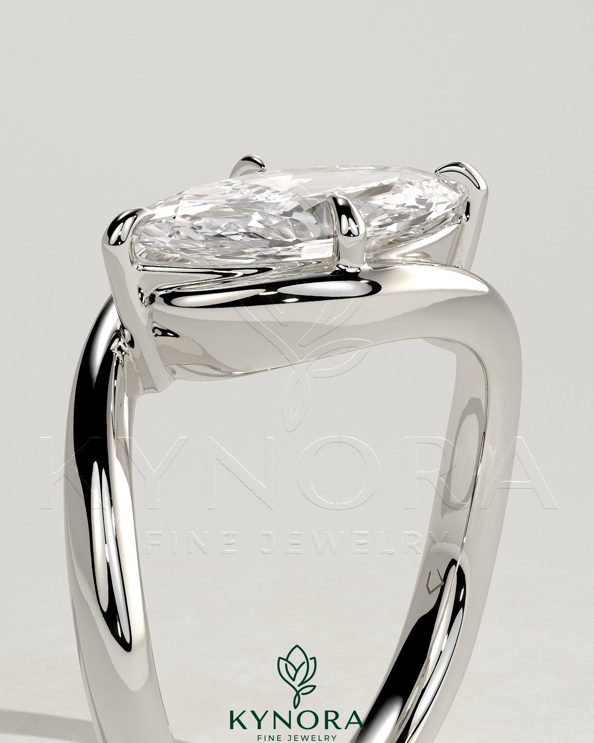 Kynora CJ 2ct marquise east-west claw solitaire engagement ring with bypass band showcasing a sparkling marquise-shaped diamond.