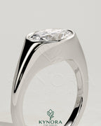 Kynora CJ 2ct oval east-west bezel solitaire engagement ring with signet band showcasing a sparkling center stone and intricate band details.