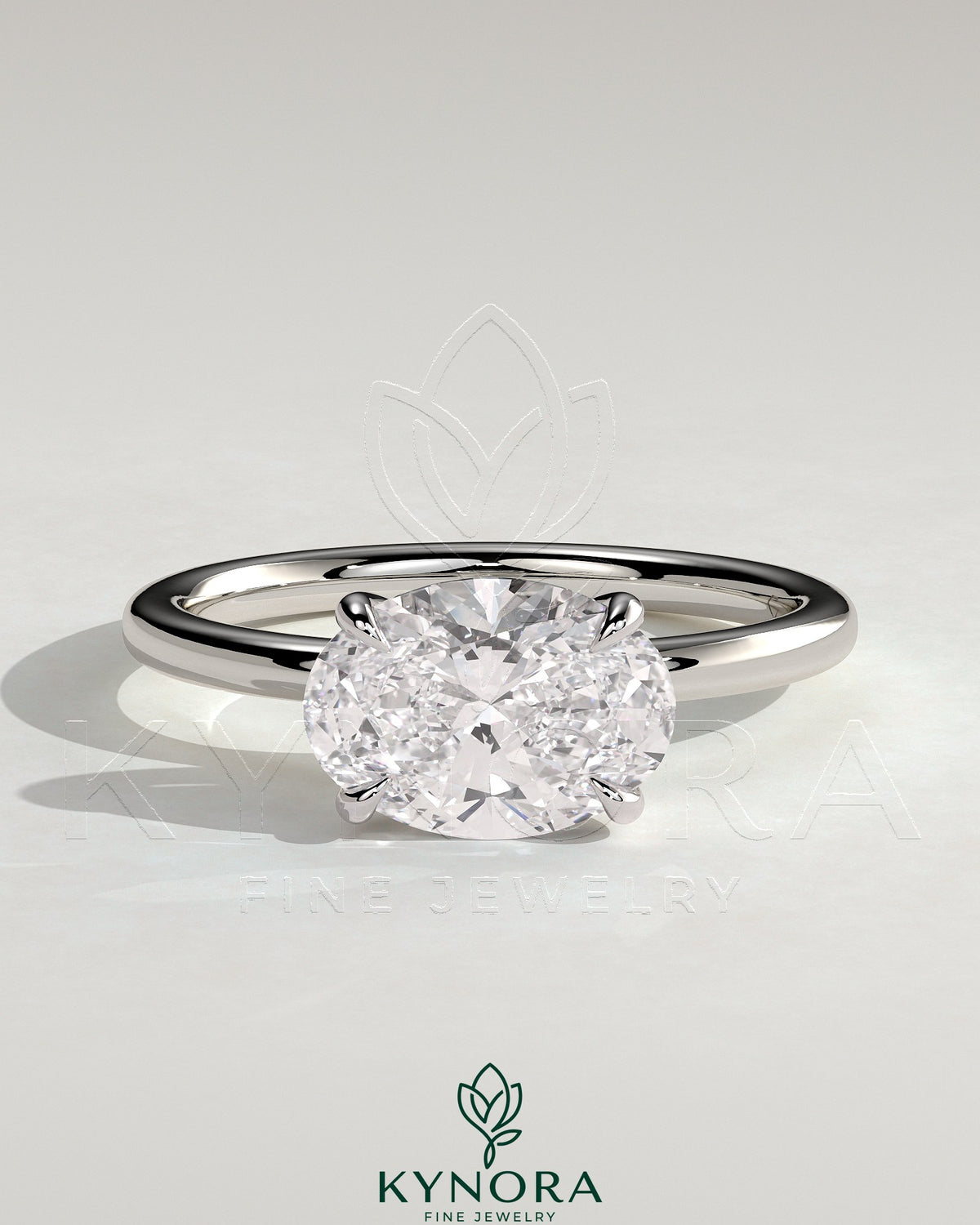 Kynora CJ 2ct oval east-west claw solitaire engagement ring with four prongs, showcasing a sparkling oval diamond design.