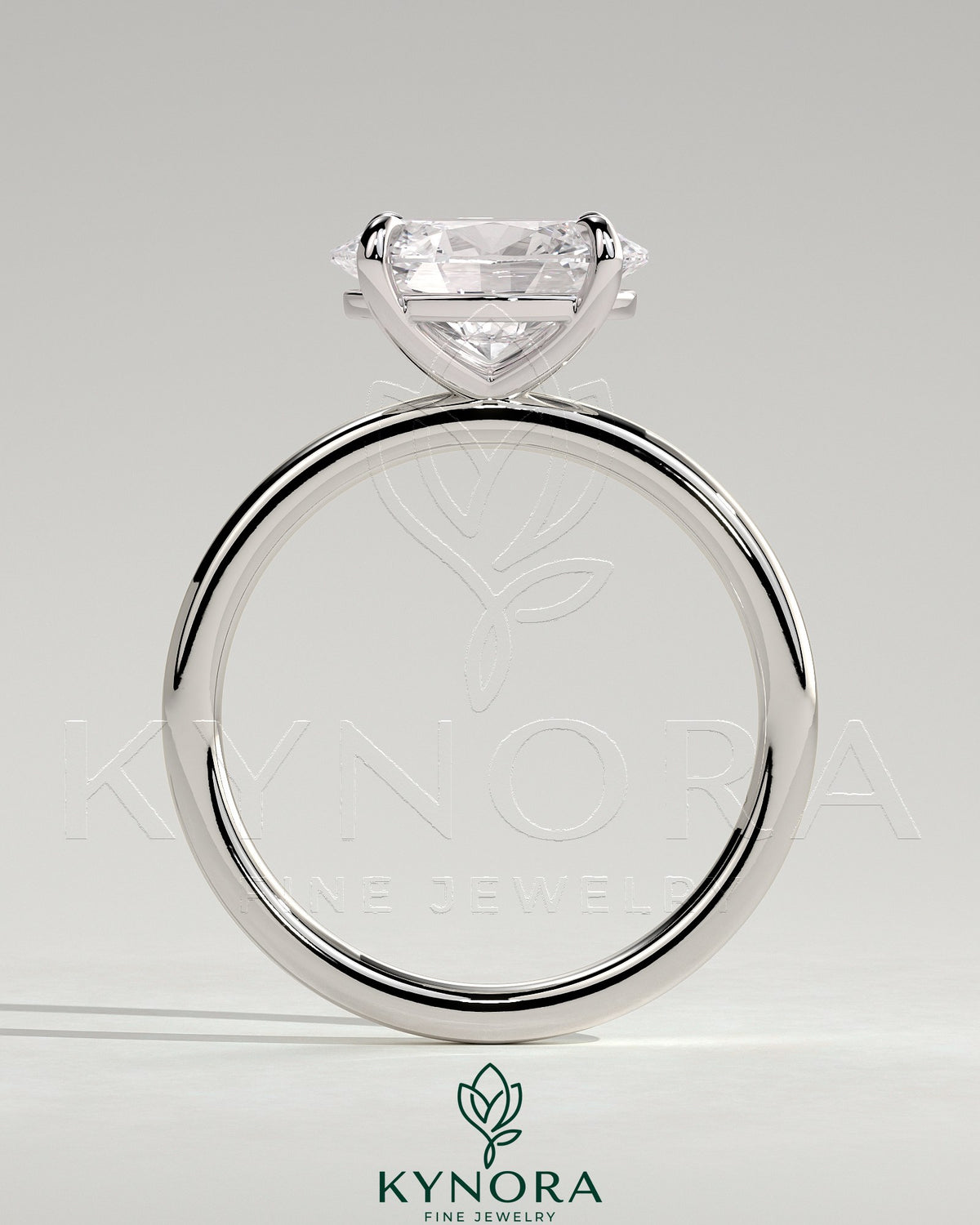 Kynora CJ 2ct oval east-west claw solitaire engagement ring with four prongs, showcasing the elegant diamond setting.