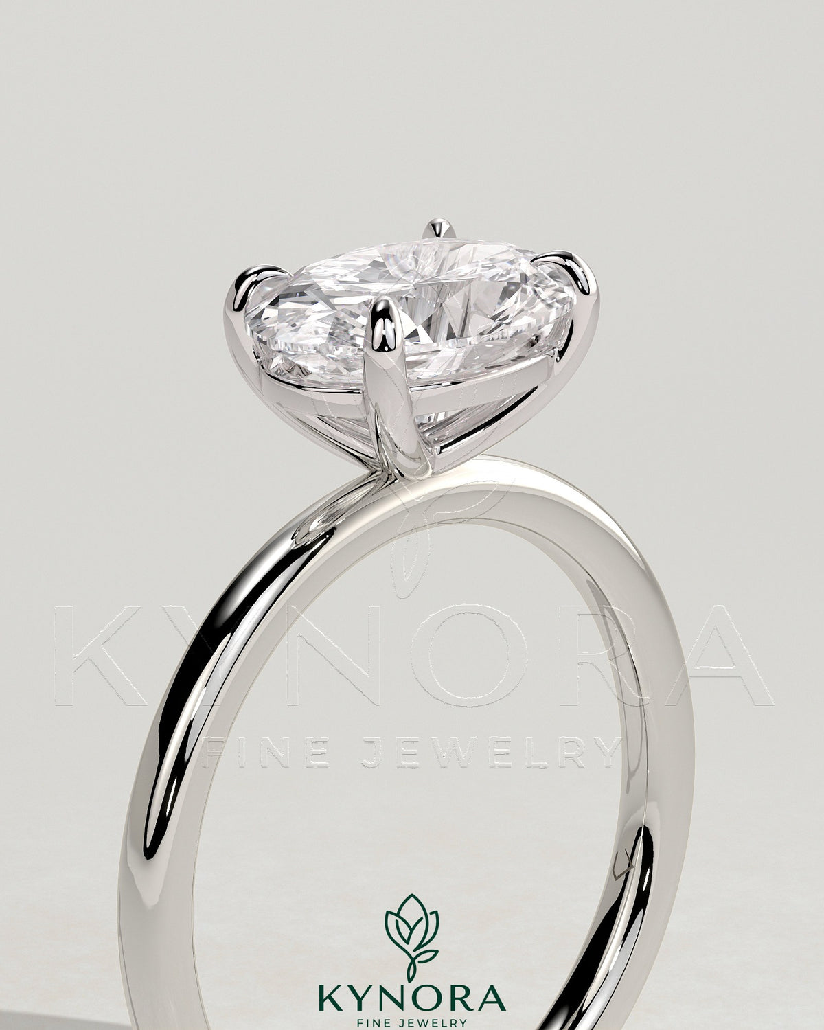 Kynora CJ 2ct oval east-west claw solitaire engagement ring with four prongs, showcasing a sparkling center diamond.