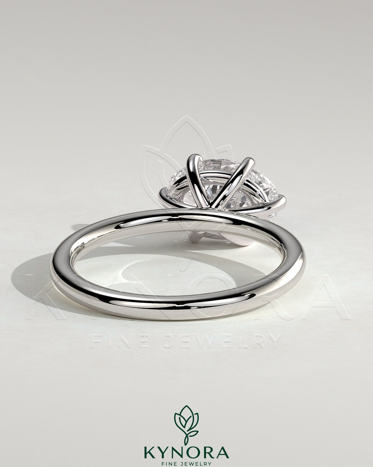 Kynora CJ 2ct oval east-west claw solitaire engagement ring with six prongs, showcasing a sparkling central diamond.