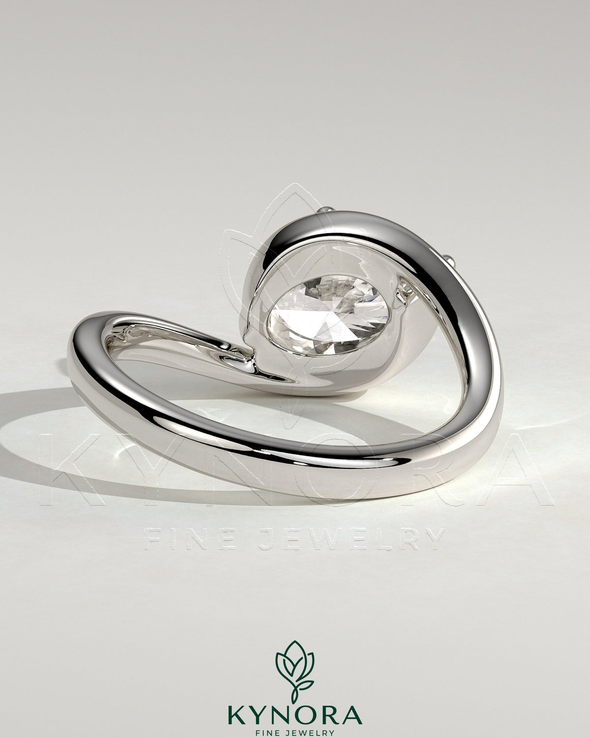 East-West 2ct oval diamond solitaire engagement ring with bypass band by Kynora CJ, showcasing the elegant design and sparkling gemstone.