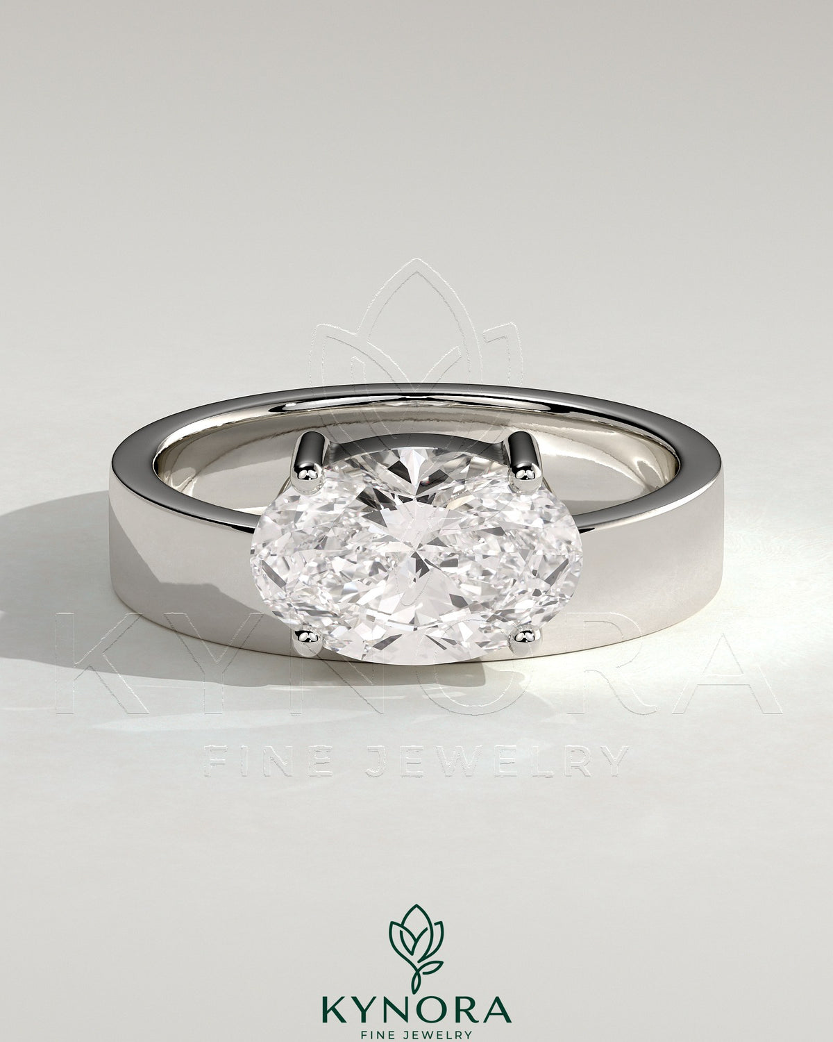 Kynora CJ 2ct oval offset east-west claw solitaire engagement ring with flat cigar band, showcasing a sparkling diamond setting.