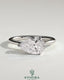Kynora CJ 2-carat pear-shaped east-west claw solitaire engagement ring with hidden halo and elegant design.