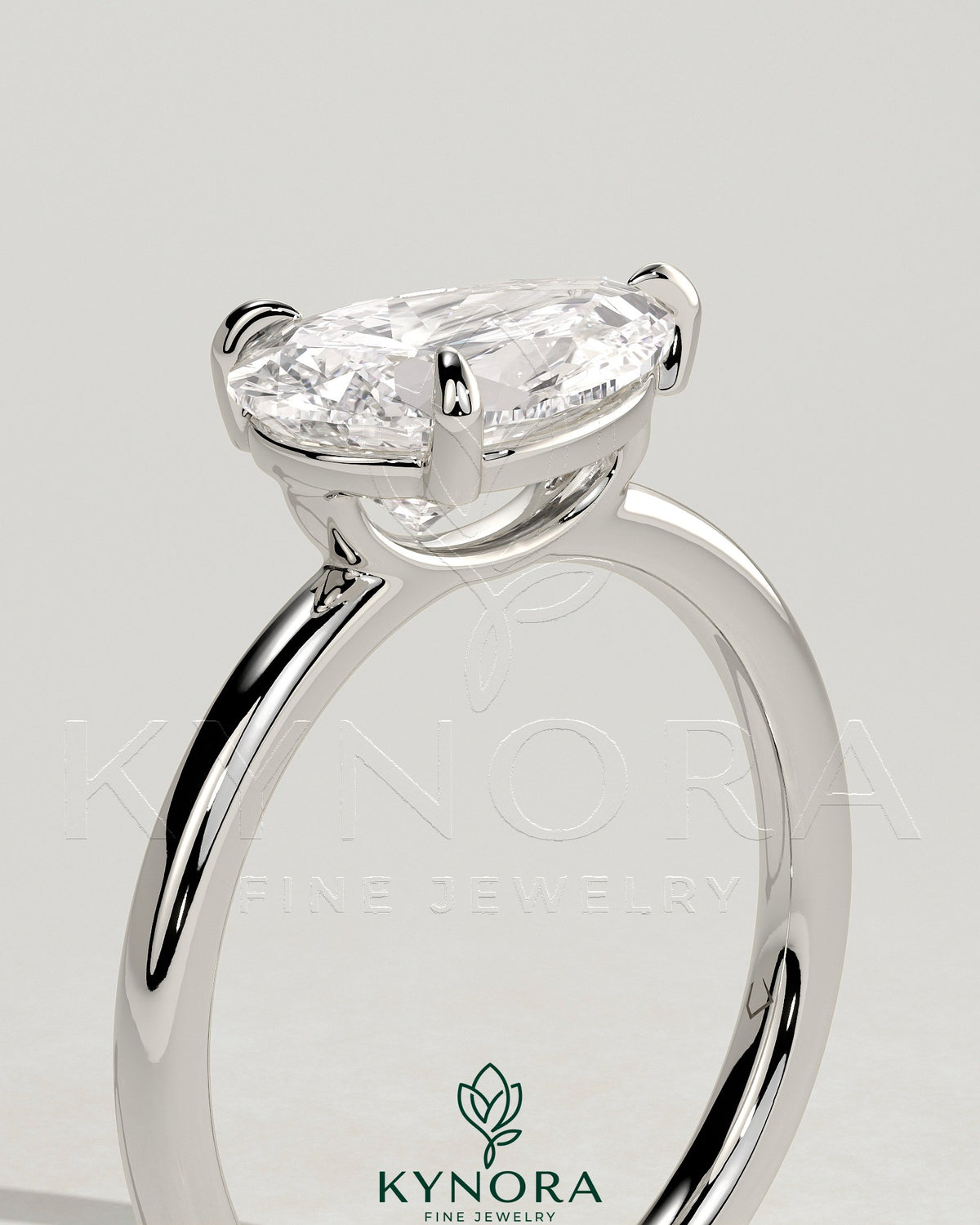 Kynora CJ 2ct pear-shaped east-west claw solitaire engagement ring with raised basket gallery in sterling silver.