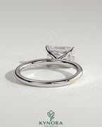 Kynora CJ 2ct radiant east-west claw solitaire engagement ring with a sparkling center diamond on a sleek band