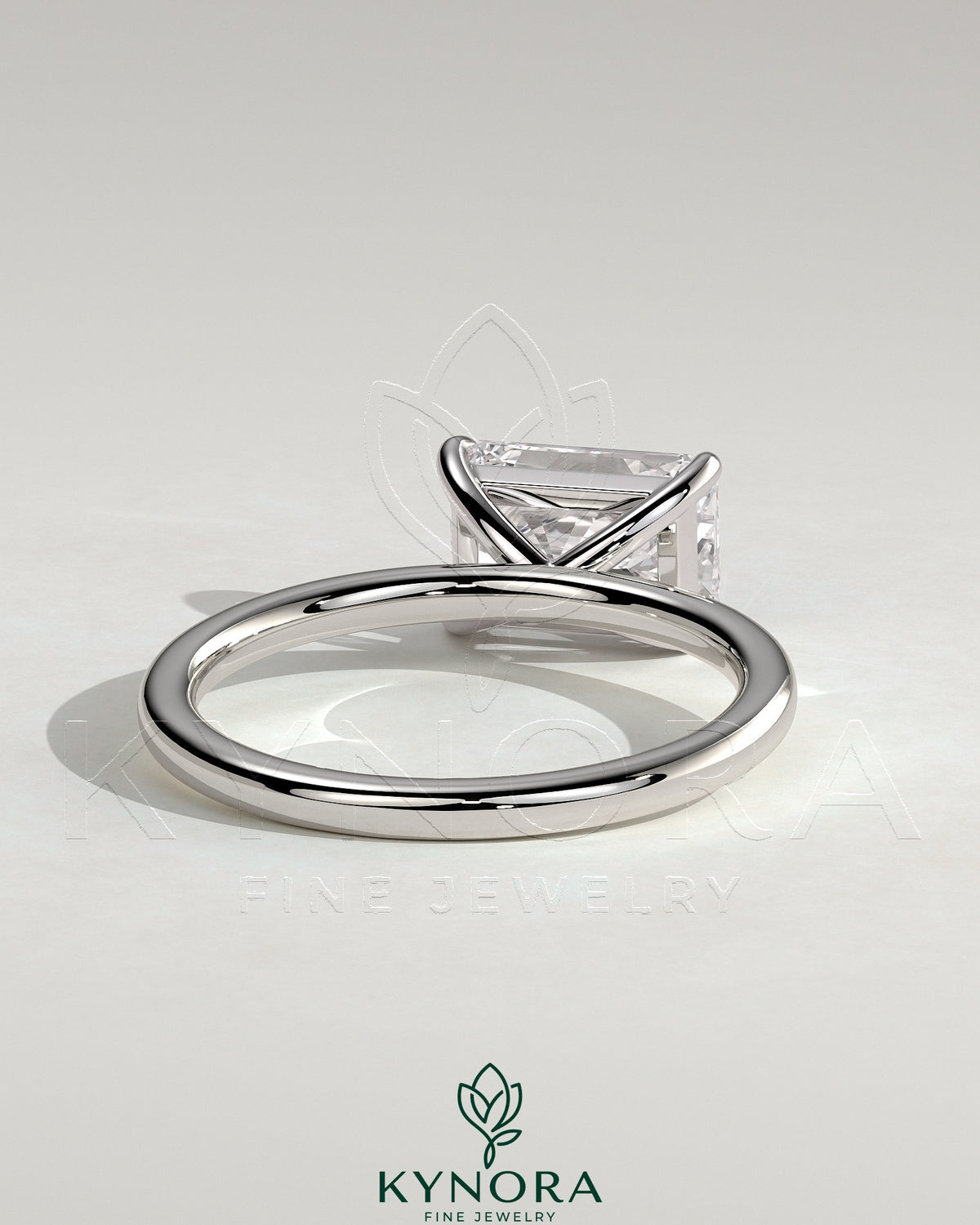 Kynora CJ 2ct radiant east-west claw solitaire engagement ring with a sparkling center diamond on a sleek band