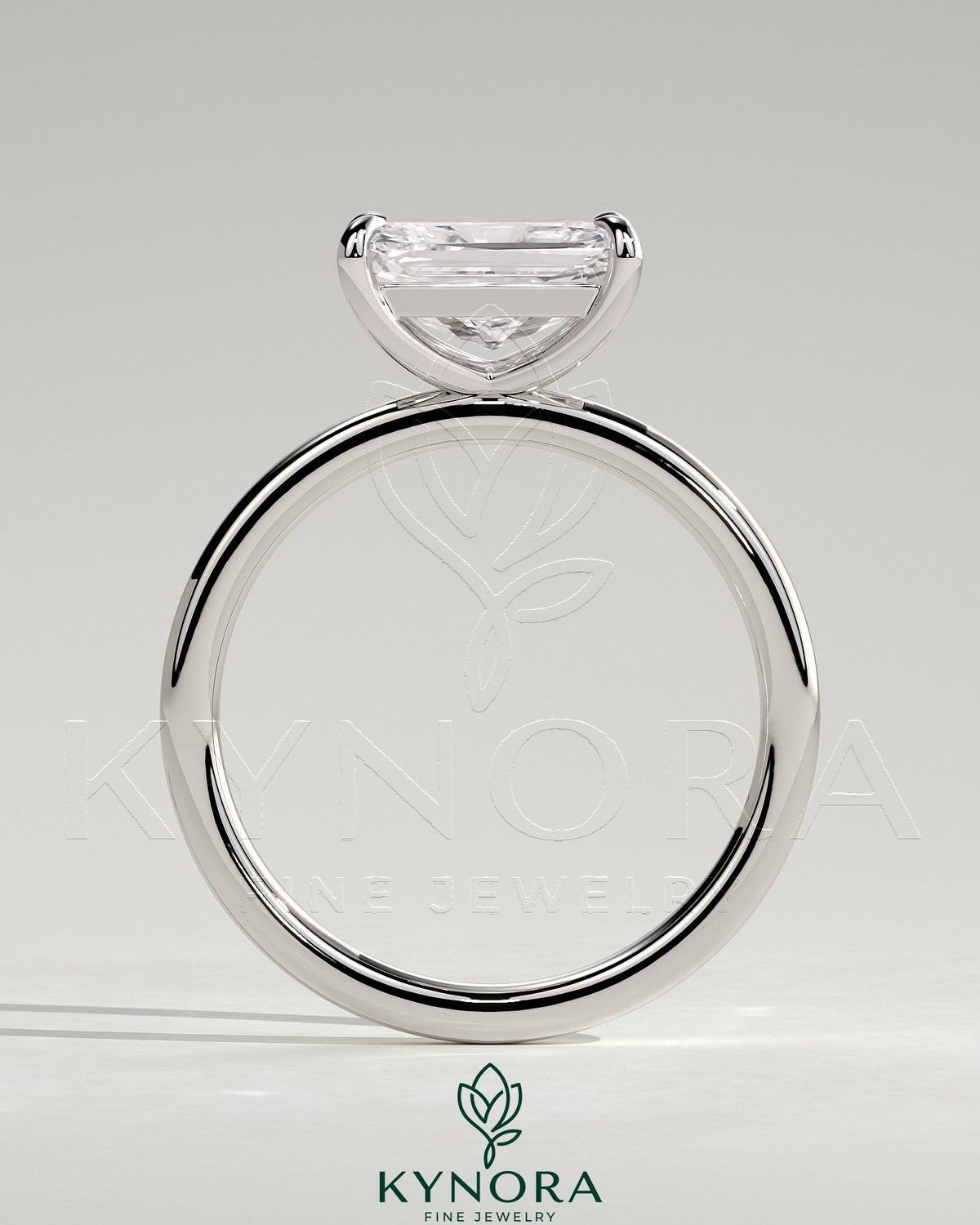 Kynora CJ 2ct radiant diamond east-west claw solitaire engagement ring with a sleek band and modern design.
