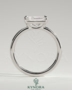 Kynora CJ 2ct radiant east-west claw solitaire engagement ring with raised basket gallery and elegant design.