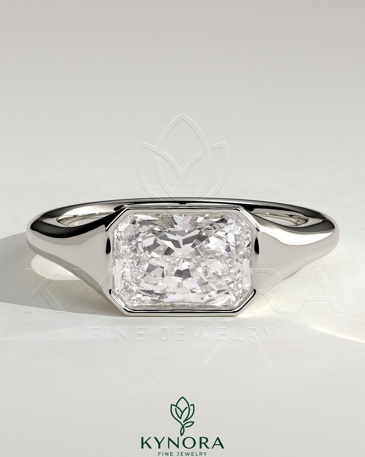 Kynora CJ Radiant East-West Bezel Solitaire engagement ring with signet band, showcasing a radiant-cut center stone and elegant design.