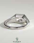 Kynora CJ Radiant East-West Bezel Solitaire engagement ring with signet band, featuring a radiant-cut gemstone in a sleek, elegant setting
