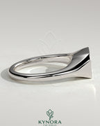 Kynora CJ Radiant East-West Bezel Solitaire Engagement Ring with Signet Band, showcasing a radiant-cut diamond set horizontally.