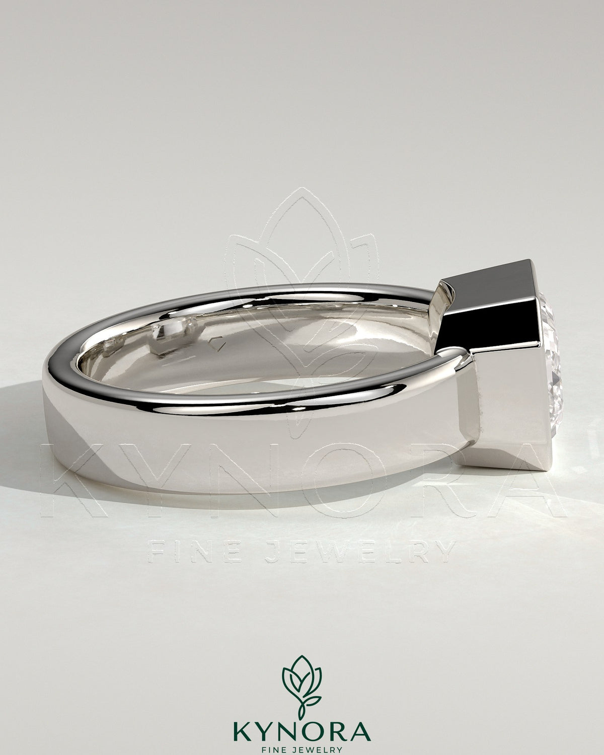 Kynora CJ statement 2ct emerald east-west bezel solitaire engagement ring with flat cigar band, showcasing a prominent green emerald.