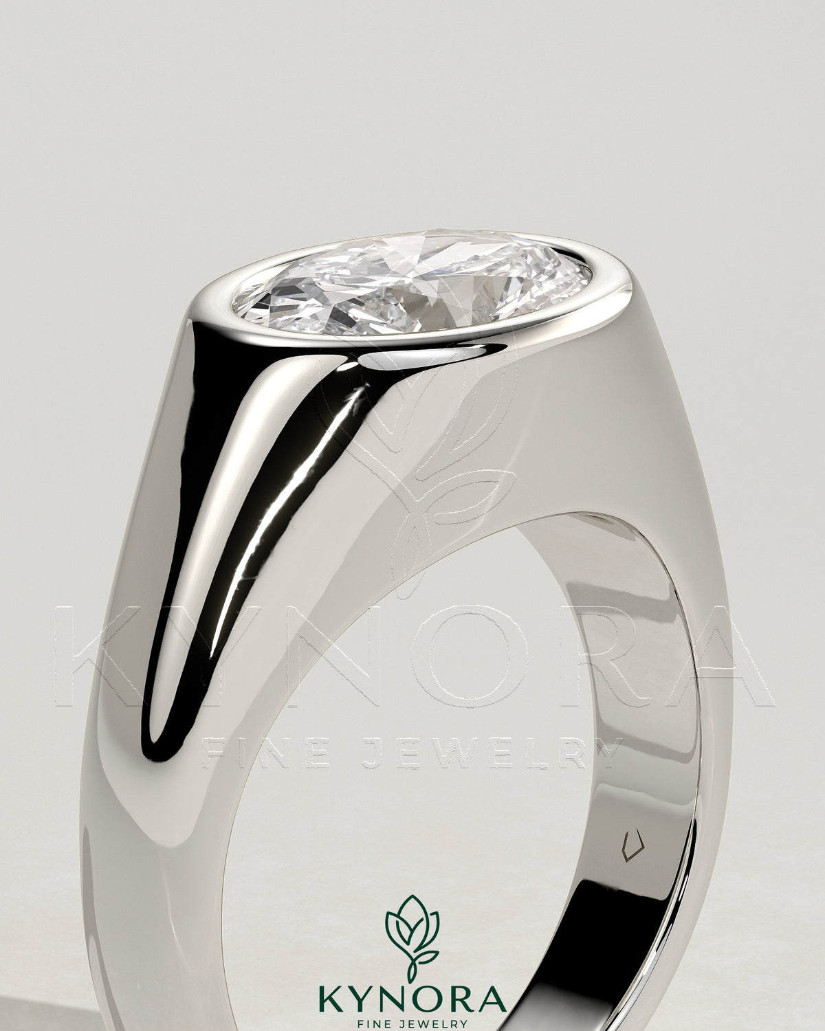 Kynora CJ oval 2ct East-West bezel solitaire engagement ring with signet band, showcasing a sparkling center stone and elegant design.