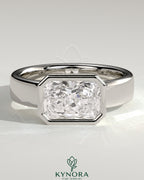 Kynora CJ radiant 2ct east-west bezel solitaire engagement ring with flat cigar band, featuring sparkling center stone and sleek design.