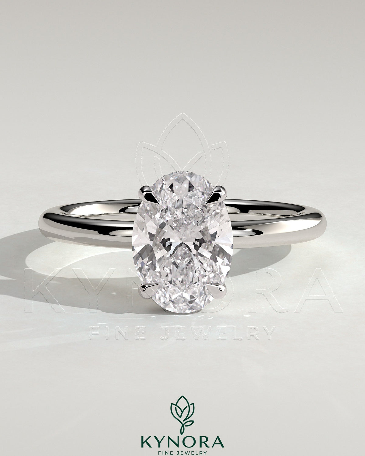 Kynora CJ classic 2ct oval claw solitaire engagement ring with hidden halo, featuring a sparkling center stone and elegant band. Main image