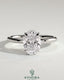Kynora CJ classic 2ct oval claw solitaire engagement ring with hidden halo, featuring a sparkling center stone and elegant band.