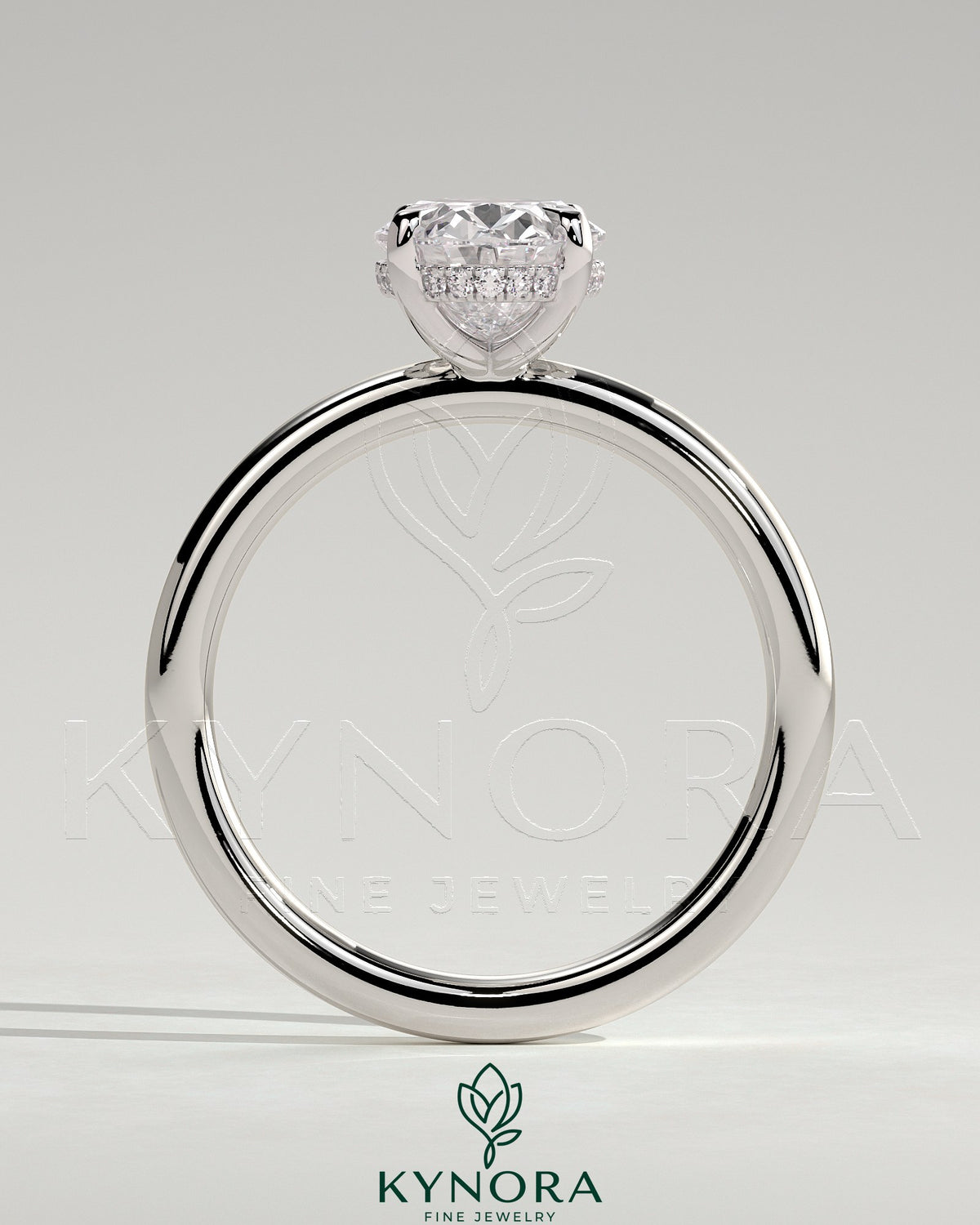 Kynora CJ Classic 2ct oval claw solitaire engagement ring with hidden halo, showcasing a sparkling oval diamond and elegant band.