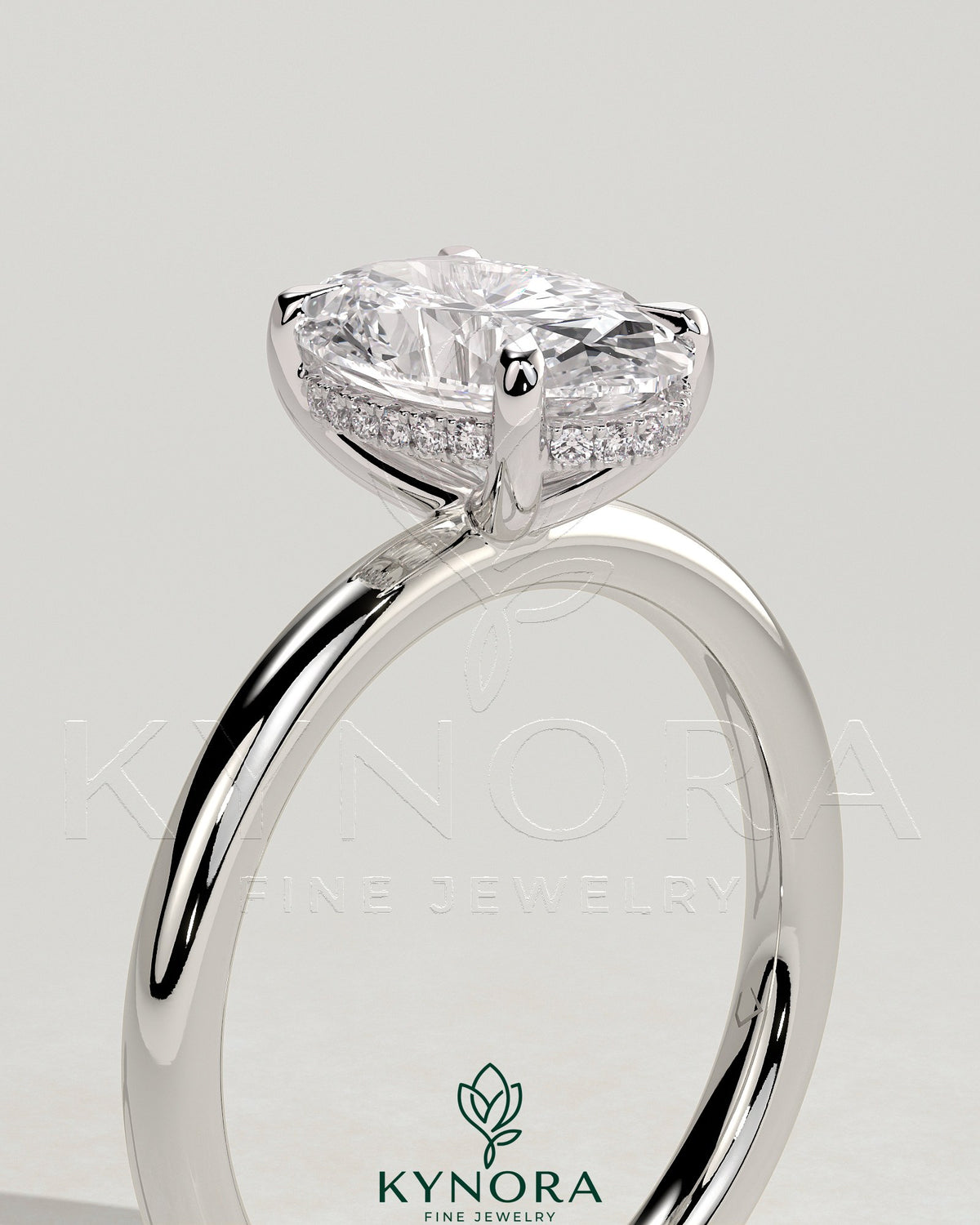 Kynora CJ classic 2ct oval claw solitaire engagement ring with hidden halo, featuring a sparkling central diamond and elegant band